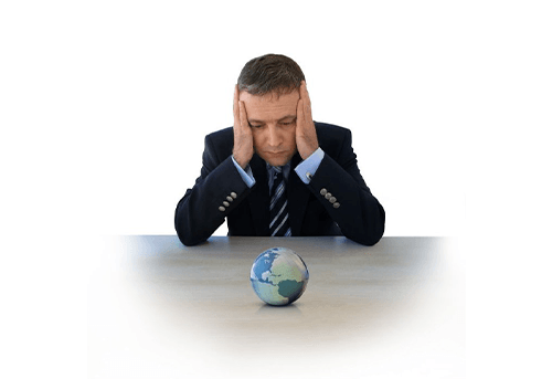 Man looking at a globe